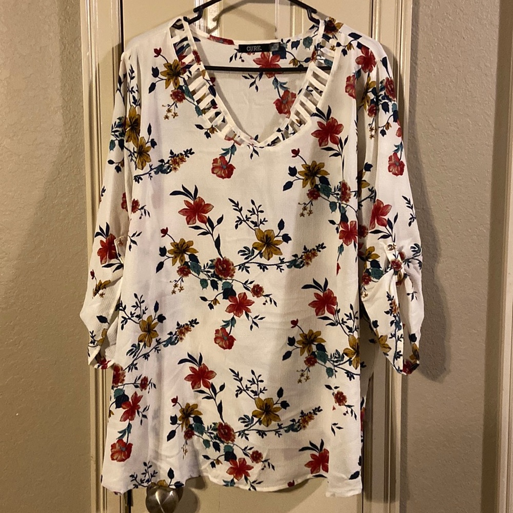 White flowery blouse